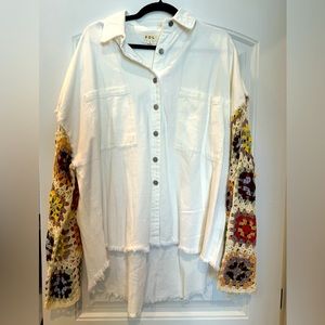 POL denim jacket with crochet sleeves.  No flaws, rips, or tears. Never worn